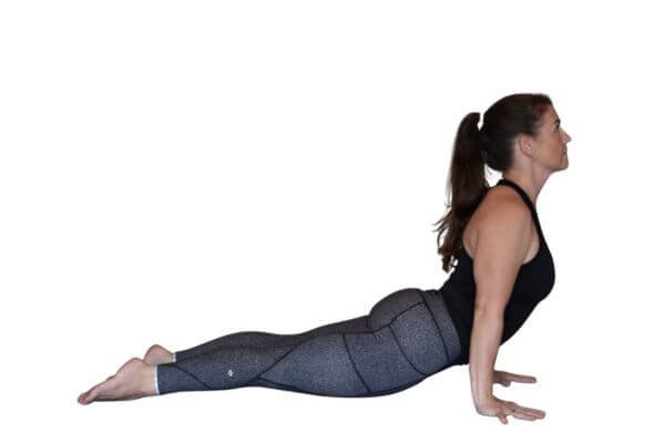 yoga teacher trainer trish corley in well aligned upward facing dog