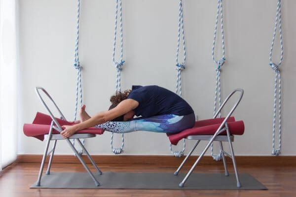 Iyengar yoga style with props