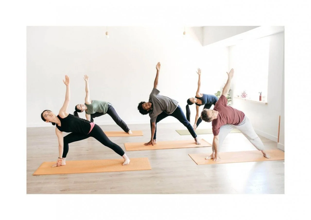 yoga students in class with teacher able to focus on bone