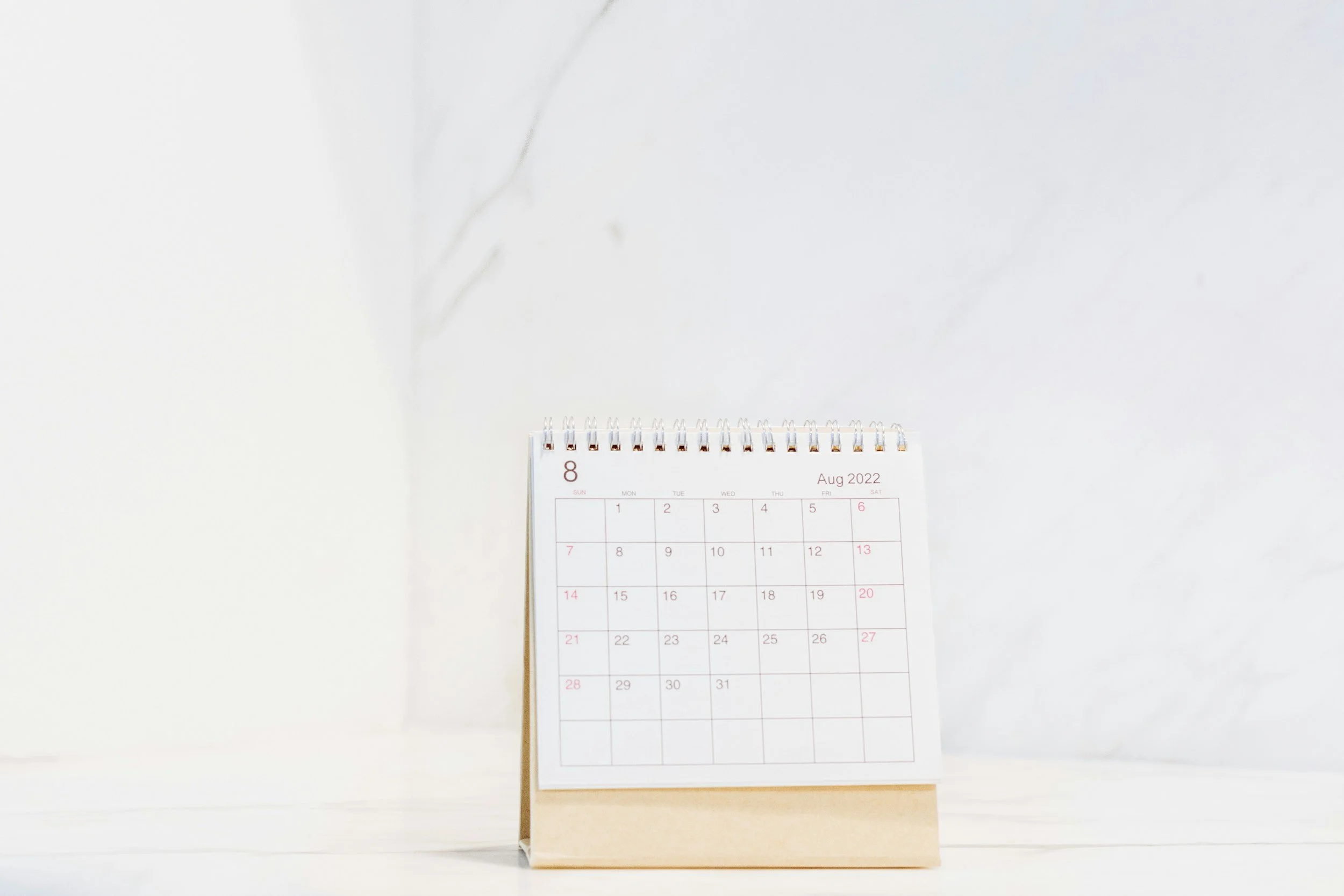 A small desk calendar to book an appointment