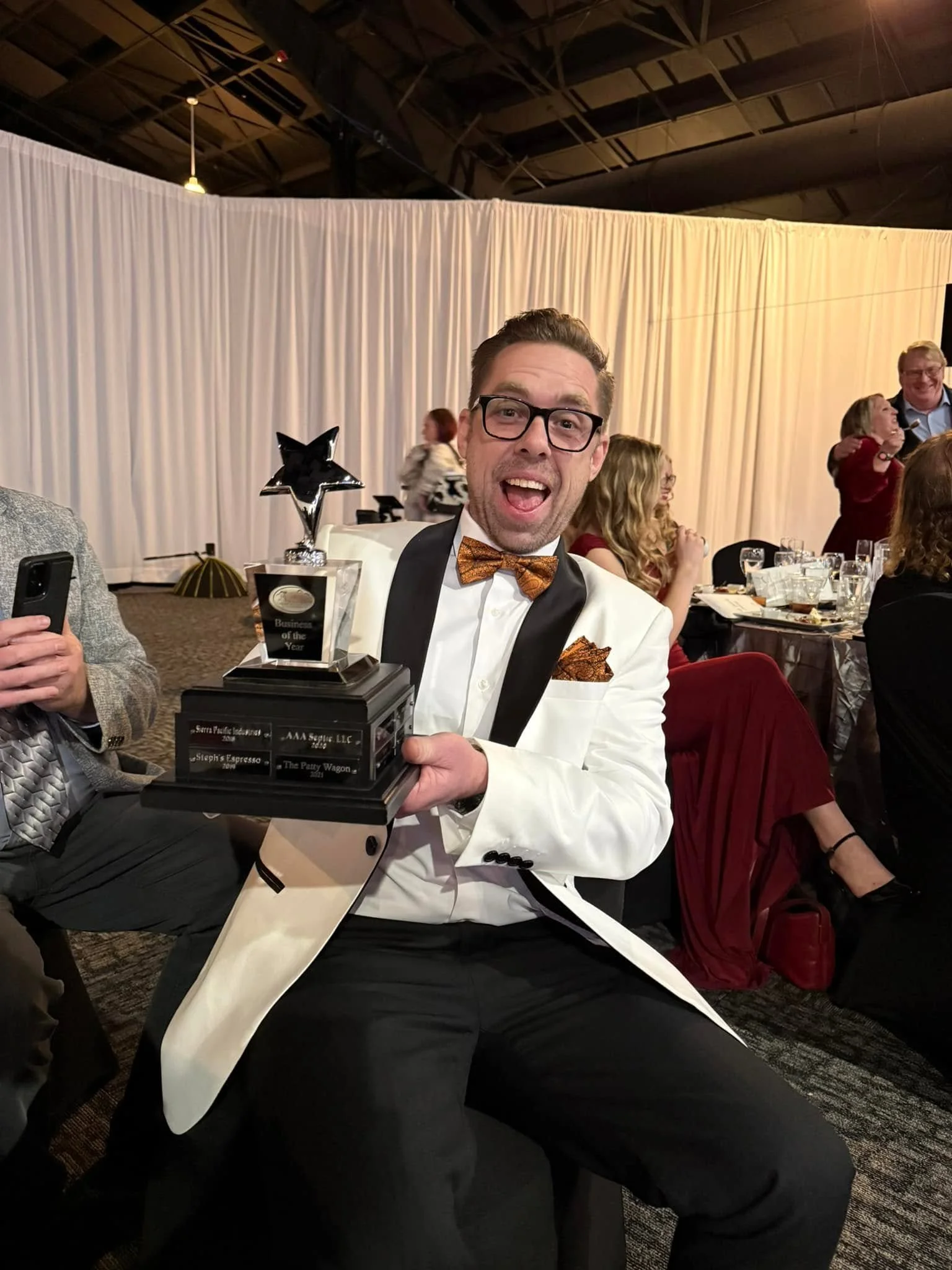 Jeff Slakey celebrating a Business of the Year award
