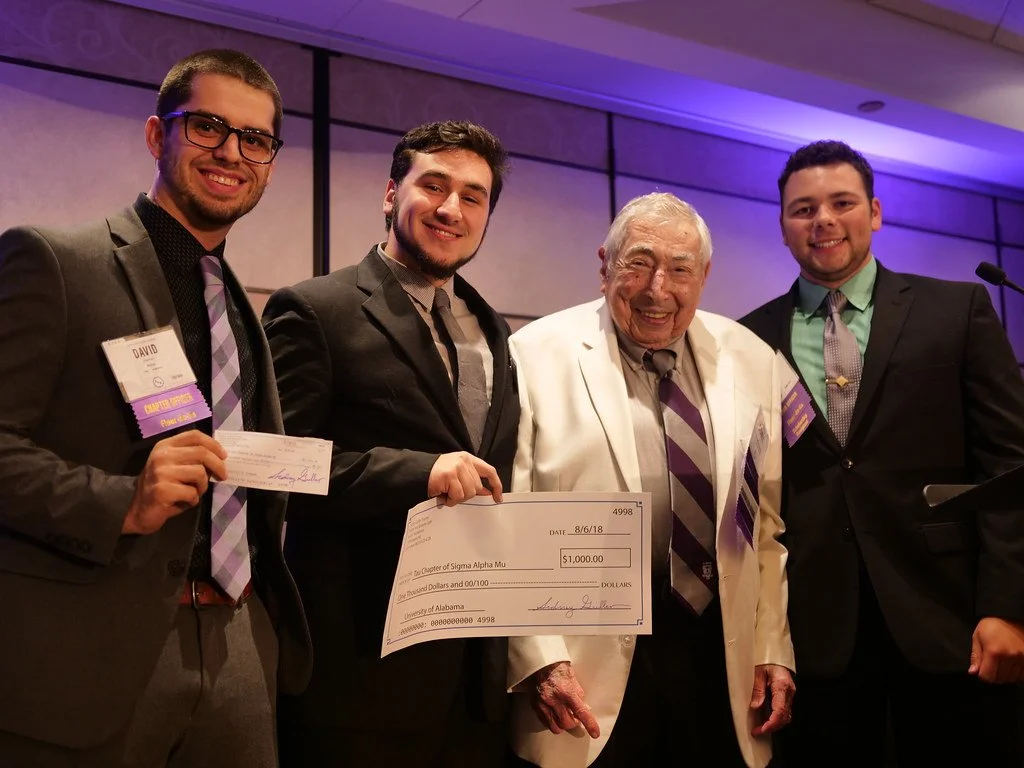 Undergraduate and chapter receiving Guller Young Scholar Award