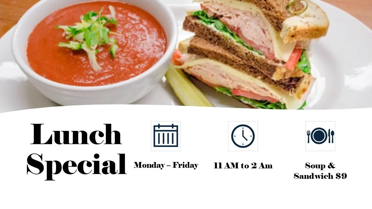 A lunch menu with a photo of a bowl of tomato soup garnished with herbs, a sandwich with lettuce, tomato, multiple types of meat, and cheese, on a white plate. The menu offers soup and sandwich for $9, available Monday through Friday from 11 AM to 2 AM.