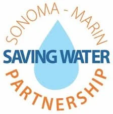 Logo for Sonoma-Mariniton Water Partnership with a water droplet and the text 'Saving Water Partnership' surrounding it.