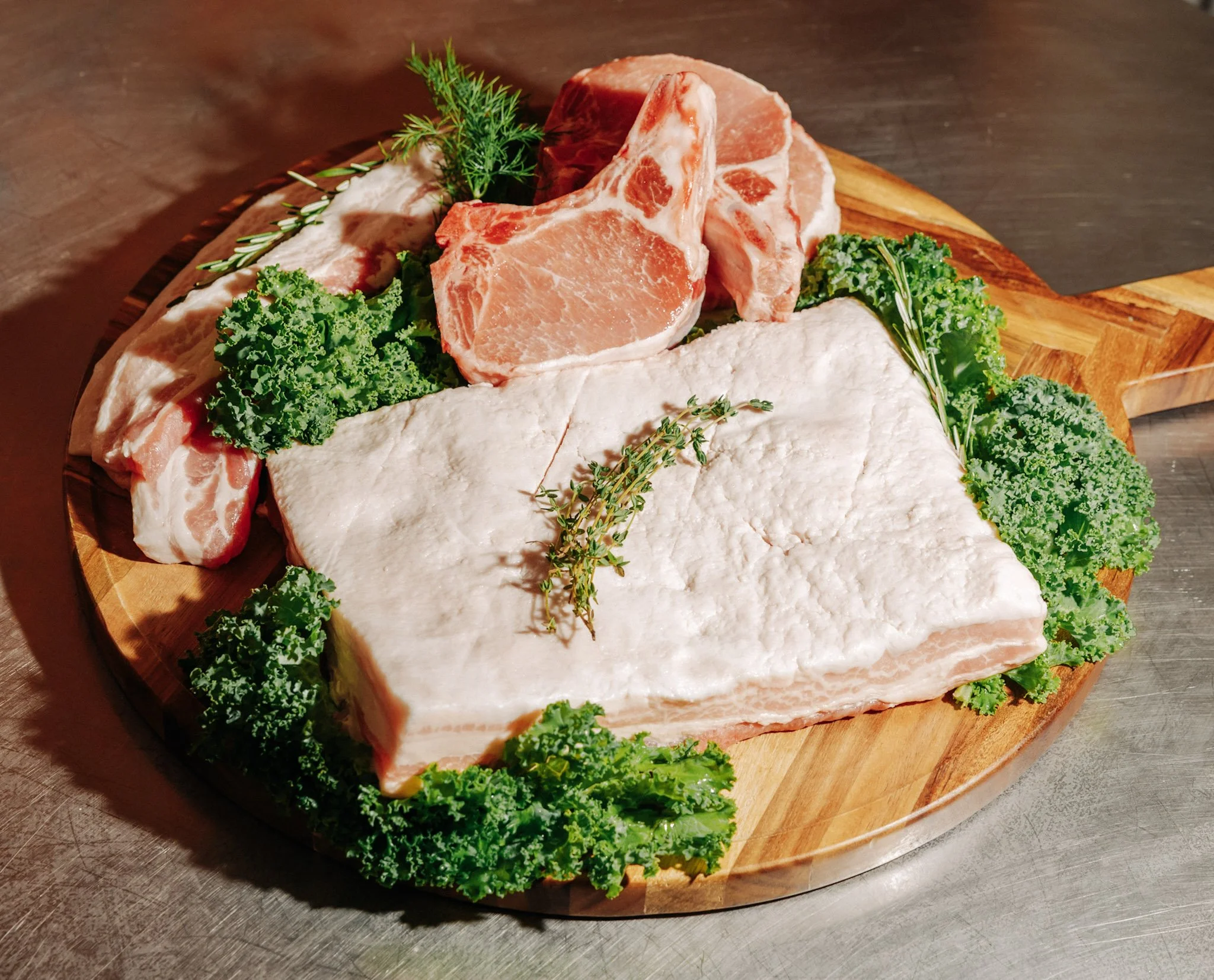 Pigs born and raised in Central Washington Truly Open Range, hoop house raised and Food Alliance Certified humanly raised pork