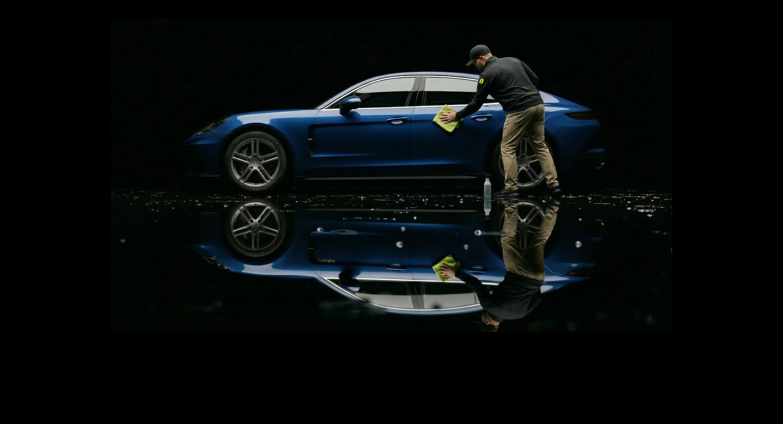 Mobile car detailing in McKinney TX cleaning blue Porsche exterior