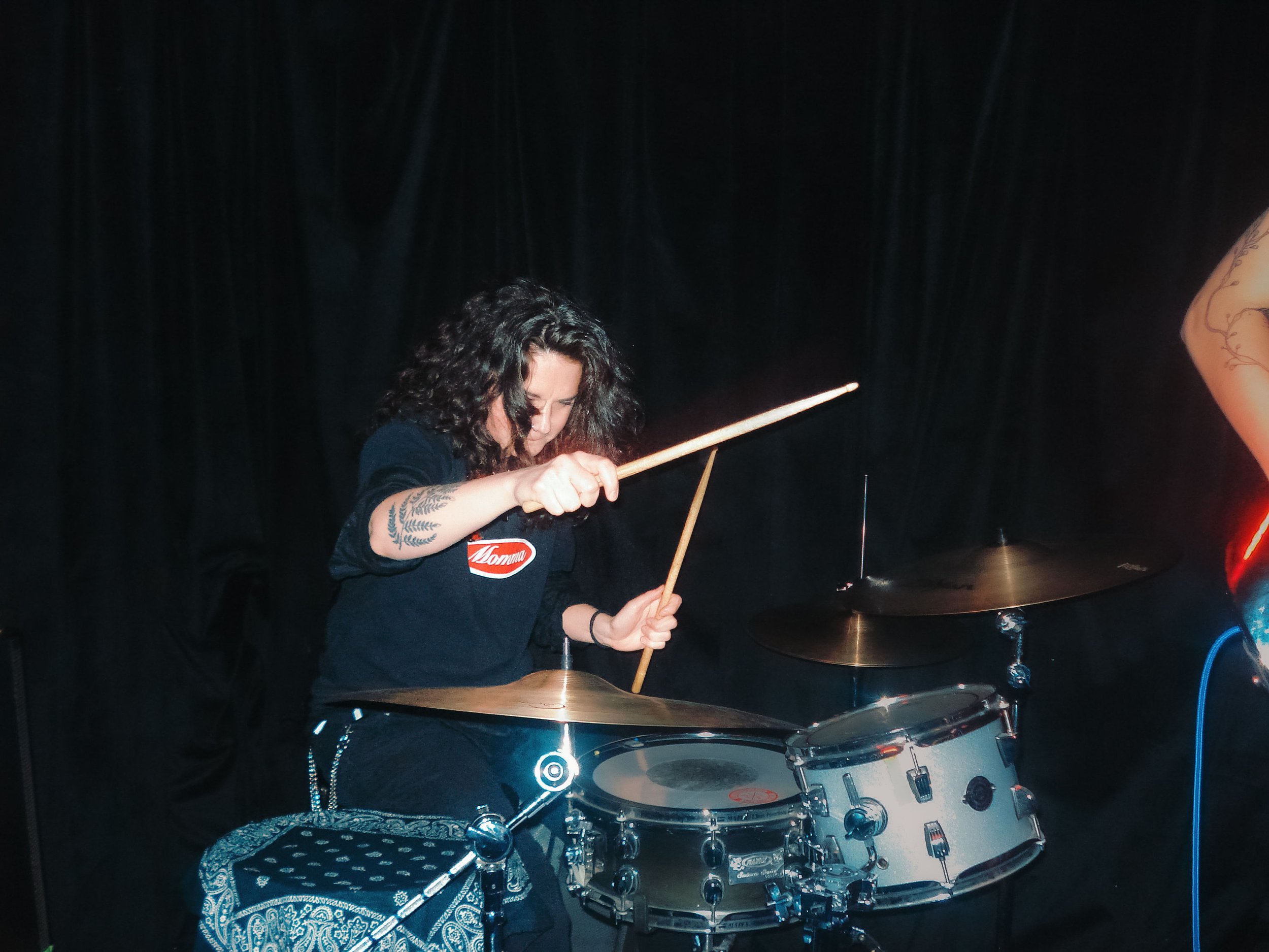 Stupid Lucky Live at Cassette in Ridgewood Queens, NYC - Photo by Beth Crane on Digital Camera. Morgan Karabel playing the drums.