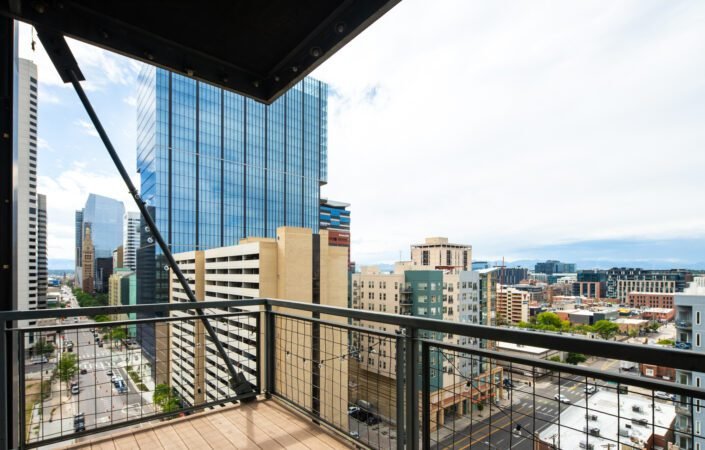 view of buildings out on a high rise patio.