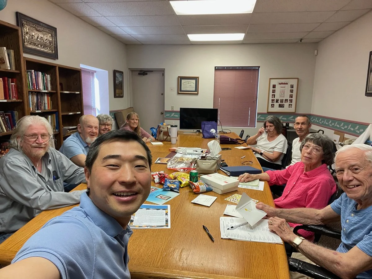 Adult Insights Sunday School Group sitting around a conference table.