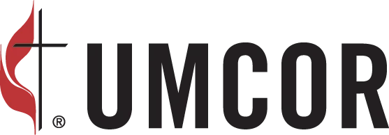 The UMCOR logo featuring a stylized red flame next to the text 'UMCOR' in black.