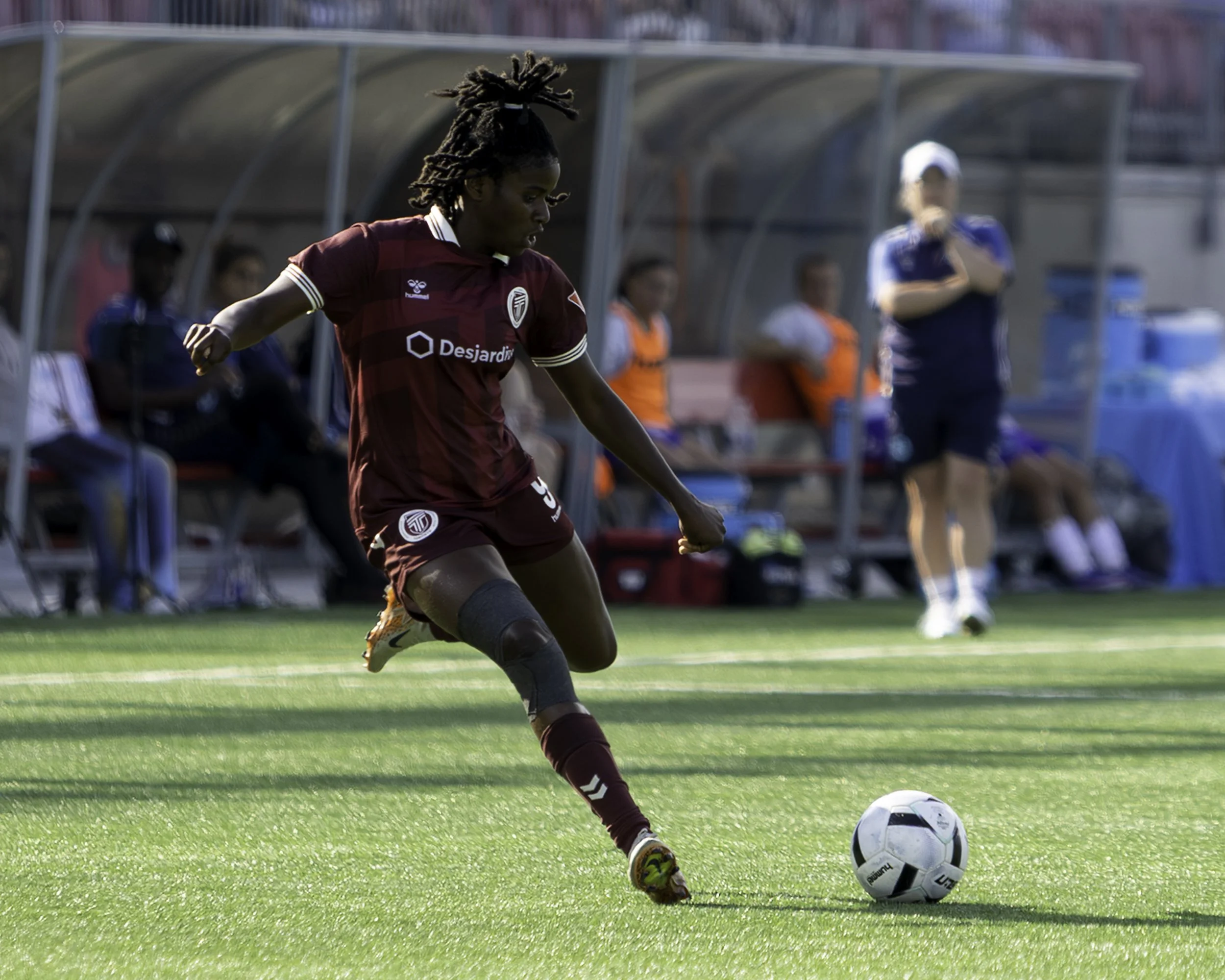 AFC Toronto striker Esther Okoronkwo takes a shot during a Northern Super League match against Montreal Roses