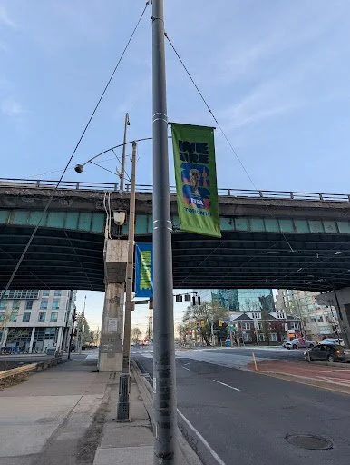 2026 FIFA World Cup flags underneath the Gardiner Expressway along Spadina Avenue, Toronto