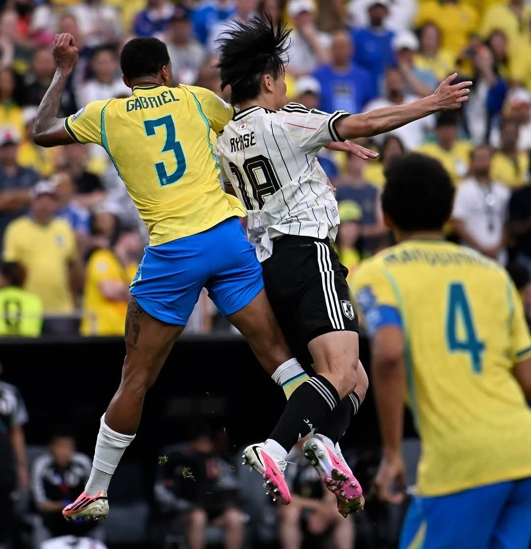 Brazil's Gabriel duels with Ayase Ueda of Japan in the World Cup Round of 32 match in Houston