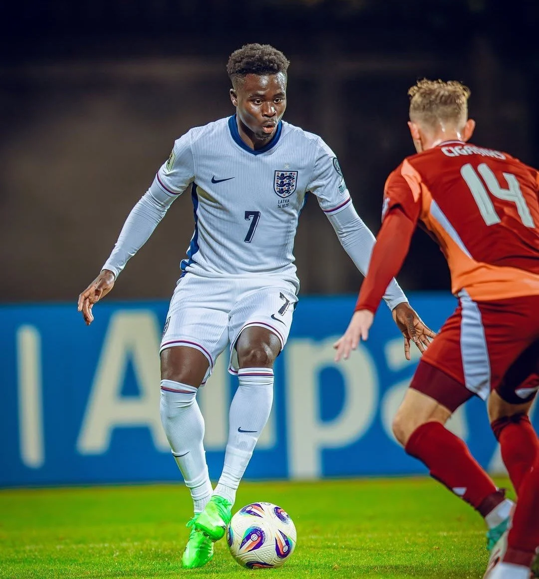 England winger Bukayo Saka runs at Latvian opposition in a World Cup qualifier in Riga