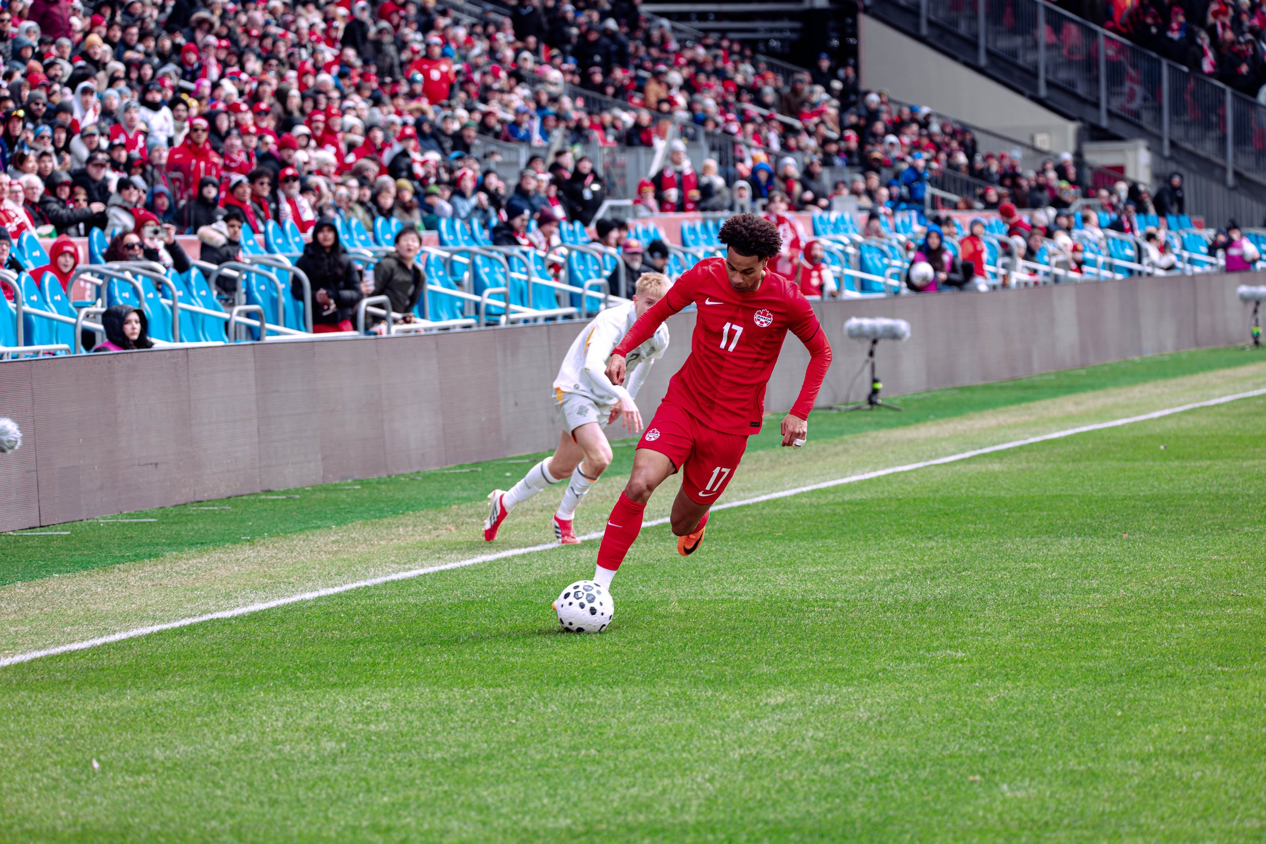 Tajon Buchanan outpaces his Icelandic opponent in a friendly match in Toronto