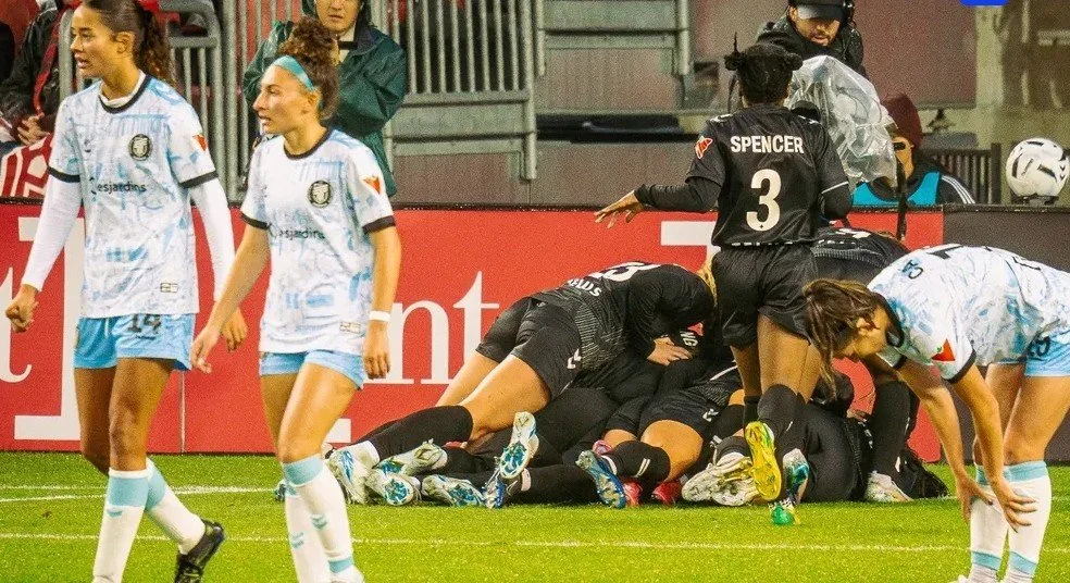 AFC Toronto players regroup after Vancouver scoreduring the Northern Super League Final at BMO Field in 2025.