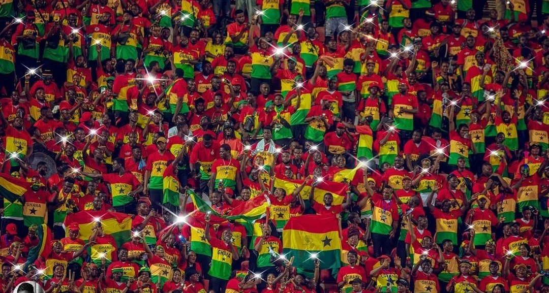 Ghana supporters waving flags in a World Cup qualifier in 2025