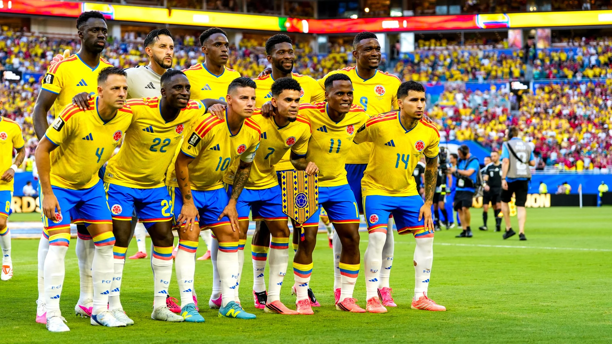 The starting XI for Colombia lines up for a team photo before a group stage match against Portugal at World Cup 2026