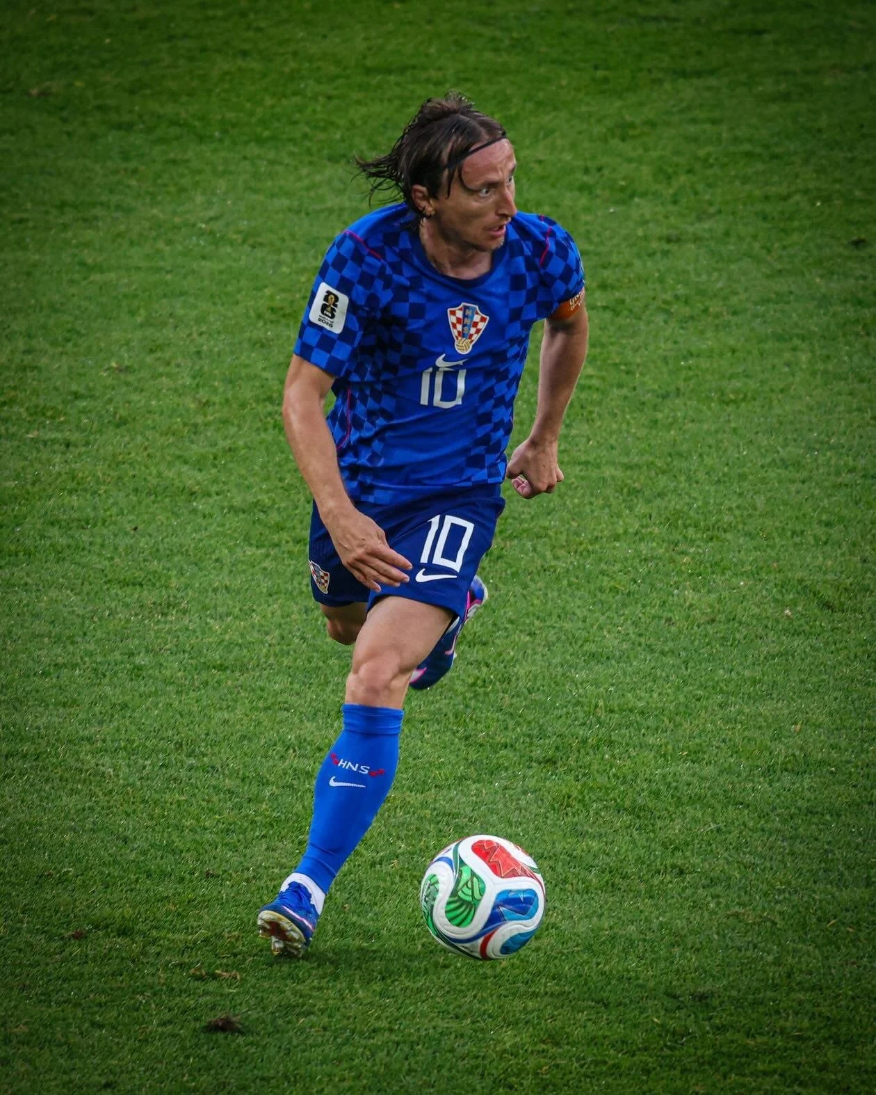 Luka Modrić advances with the ball against Portugal in a Round of 32 match against Portugal at the 2026 World Cup in Toronto.