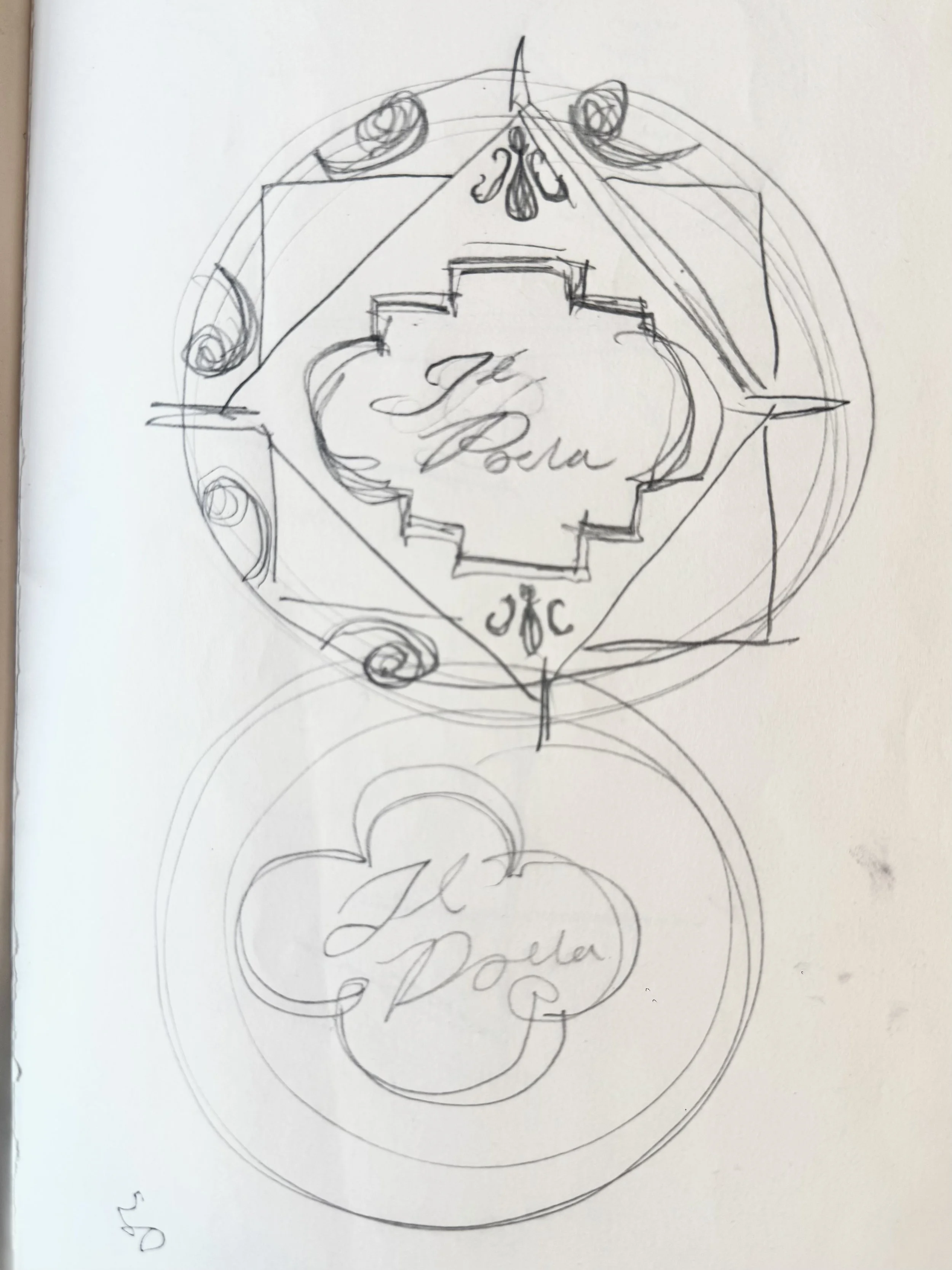 Hand-drawn sketch of a decorative design with floral and geometric elements, including a central oval shape with cursive writing and ornamental accents surrounding it.