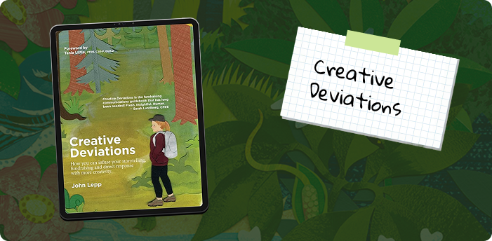A tablet displaying the cover of a book titled 'Creative Deviations' by John Lepp, with a background of a forest scene. Next to the tablet, there's a piece of graph paper taped to the background with the words 'Creative Deviations' handwritten on it.