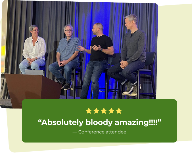Four people on a stage having a discussion; three men and one woman, with a curtain backdrop and a green testimonial box at the bottom with a five-star rating and quote.