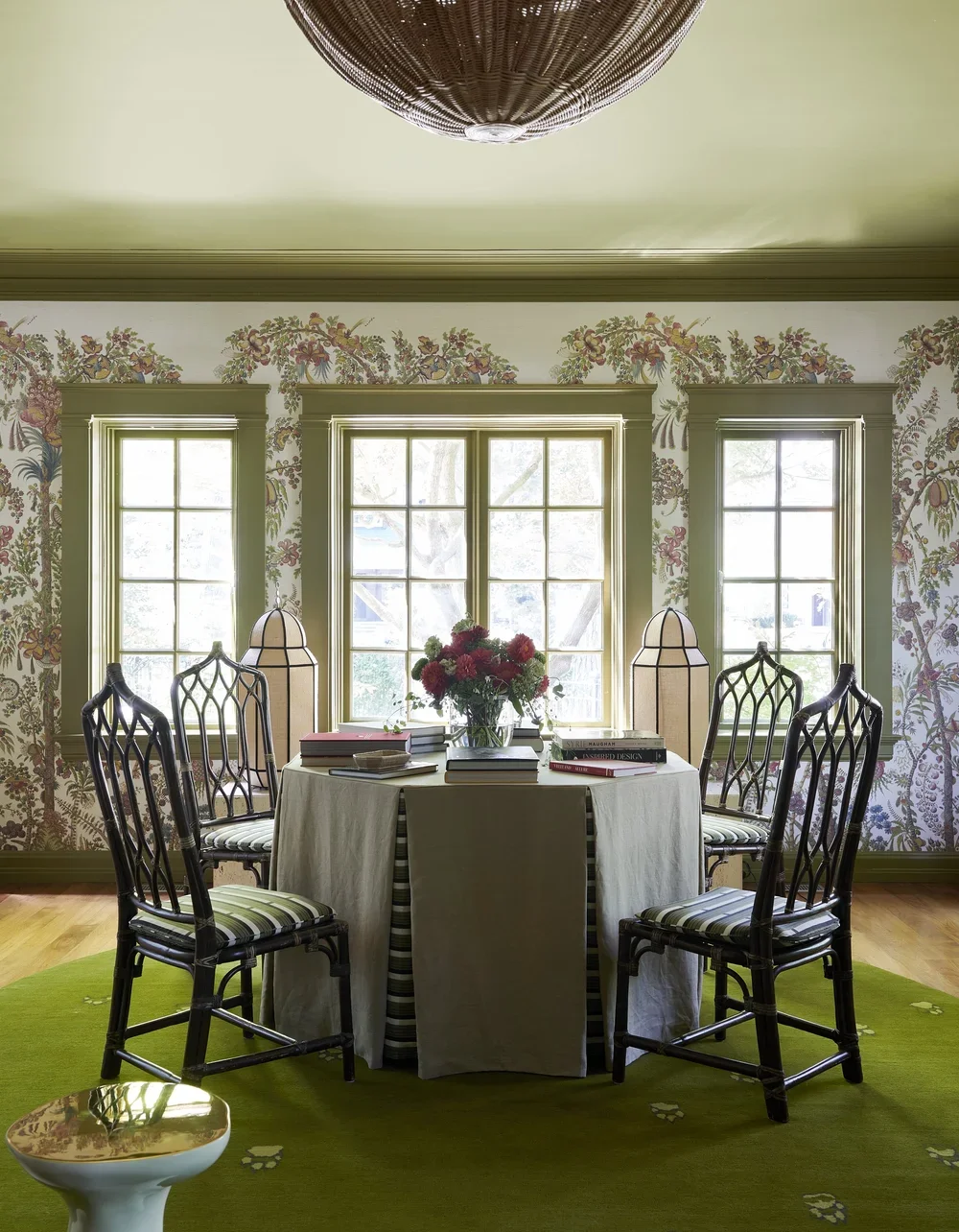 Dining room with green rug