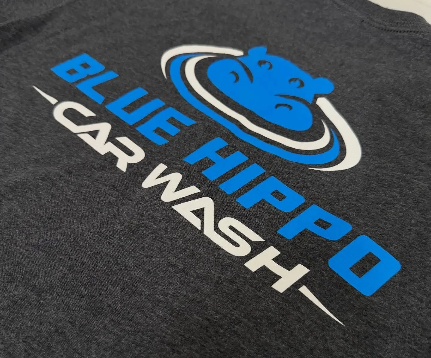 A dark gray T-shirt with a logo of the Buffalo Bills NFL team. The logo features a blue buffalo head inside a white oval, with the word 'BUFFALO' in blue above and 'BILLS' in white below.