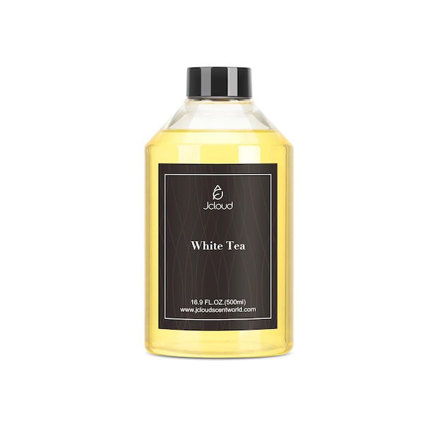 A clear plastic bottle of Jcloud White Tea scented liquid, with a black cap and black label displaying the brand name, product name, volume, and website.