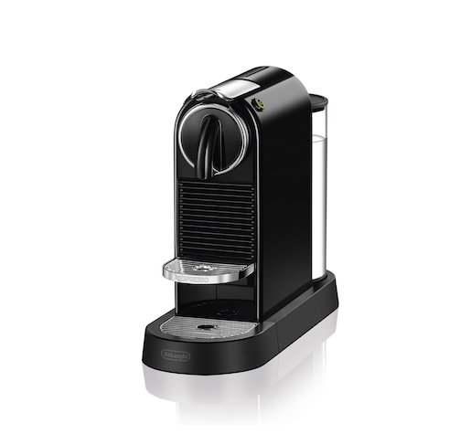 A black and silver single-serve Nespresso machine with a water reservoir on the right side and a drip tray at the base.