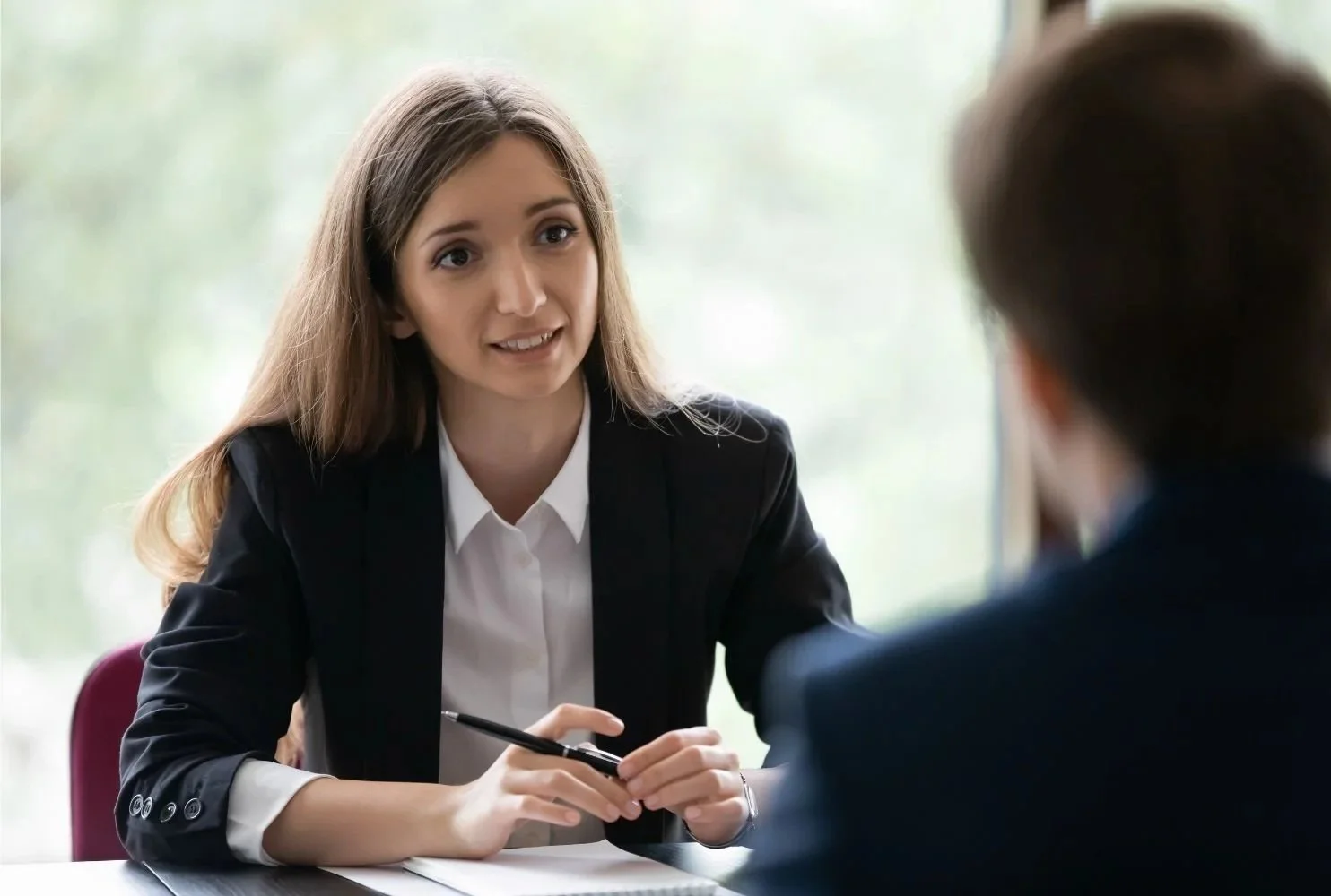 Women wearing a blazer at an interview, practicing during career coaching in Austin, TX