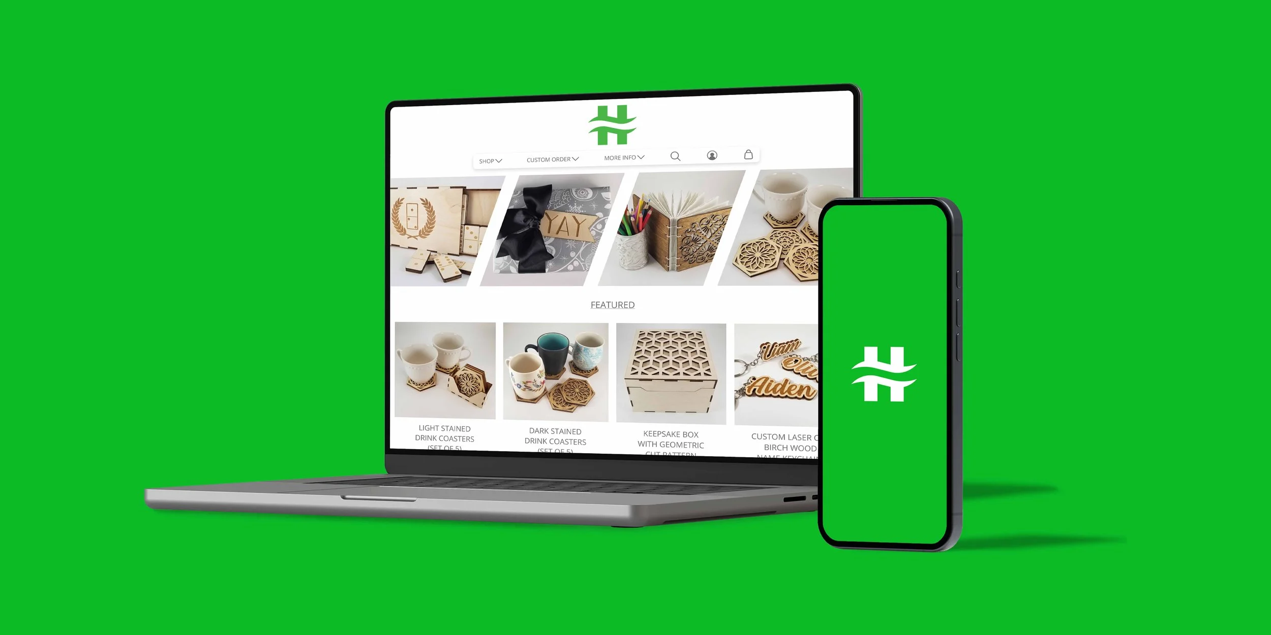 Laptop and smartphone displaying a website with wooden home decor and drinkware, set against a green background.