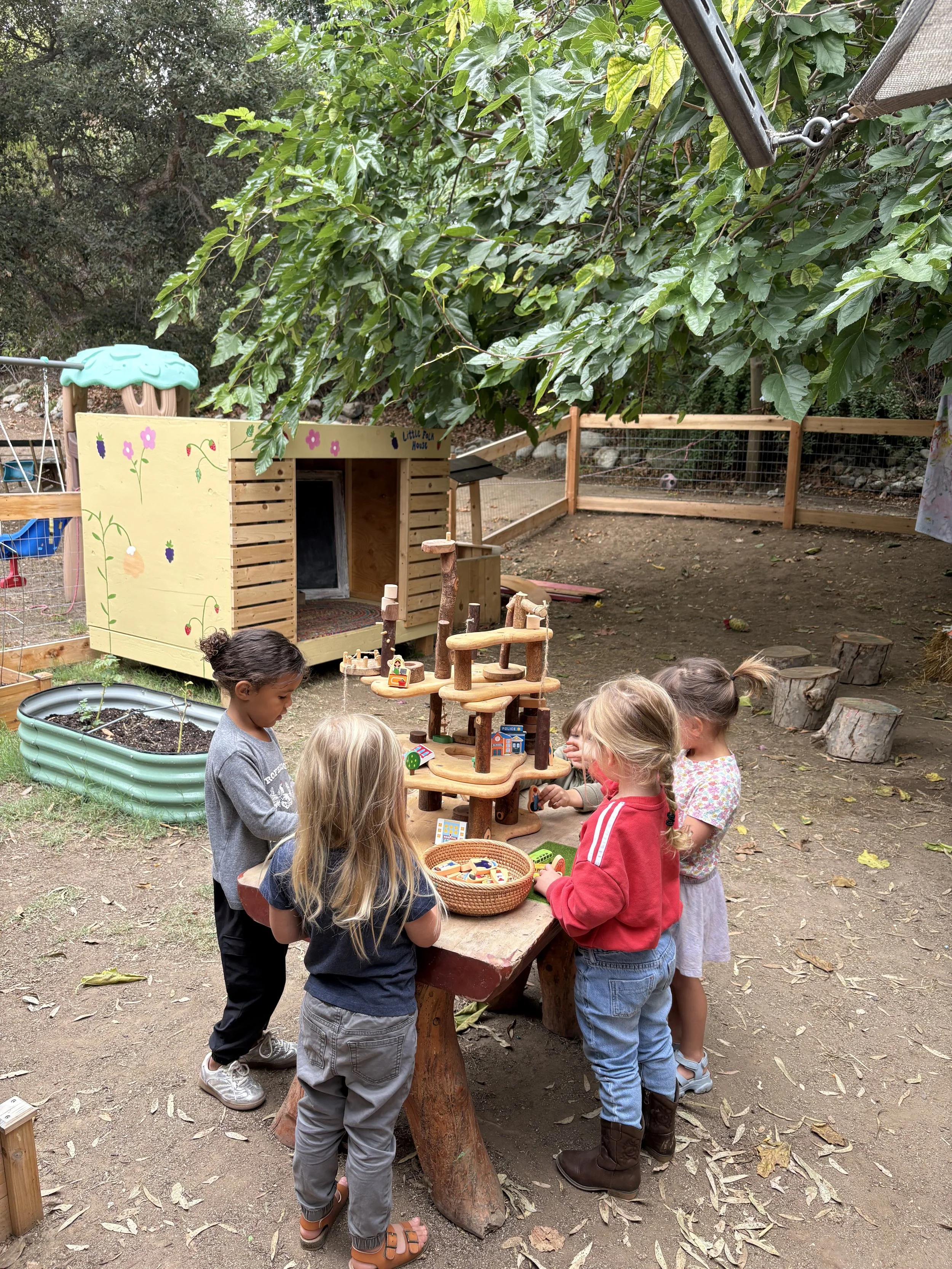 Little Folk House Children Playing With Loose Parts Outdoors
