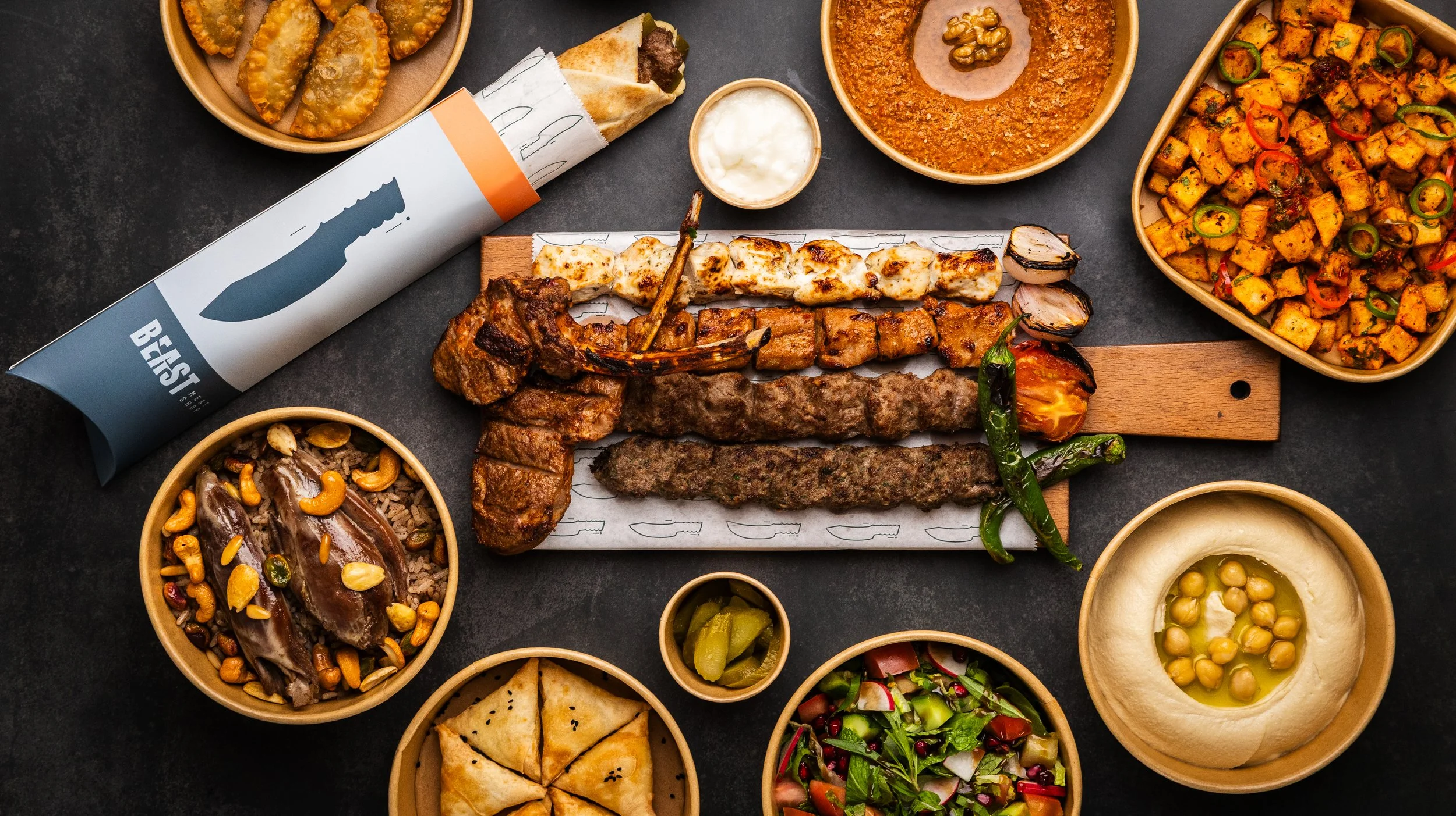 FOOD PHOTOGRAPHY BY KYNDA CREATIVE. Middle Eastern dishes including grilled kebabs, hummus with chickpeas and olive oil.