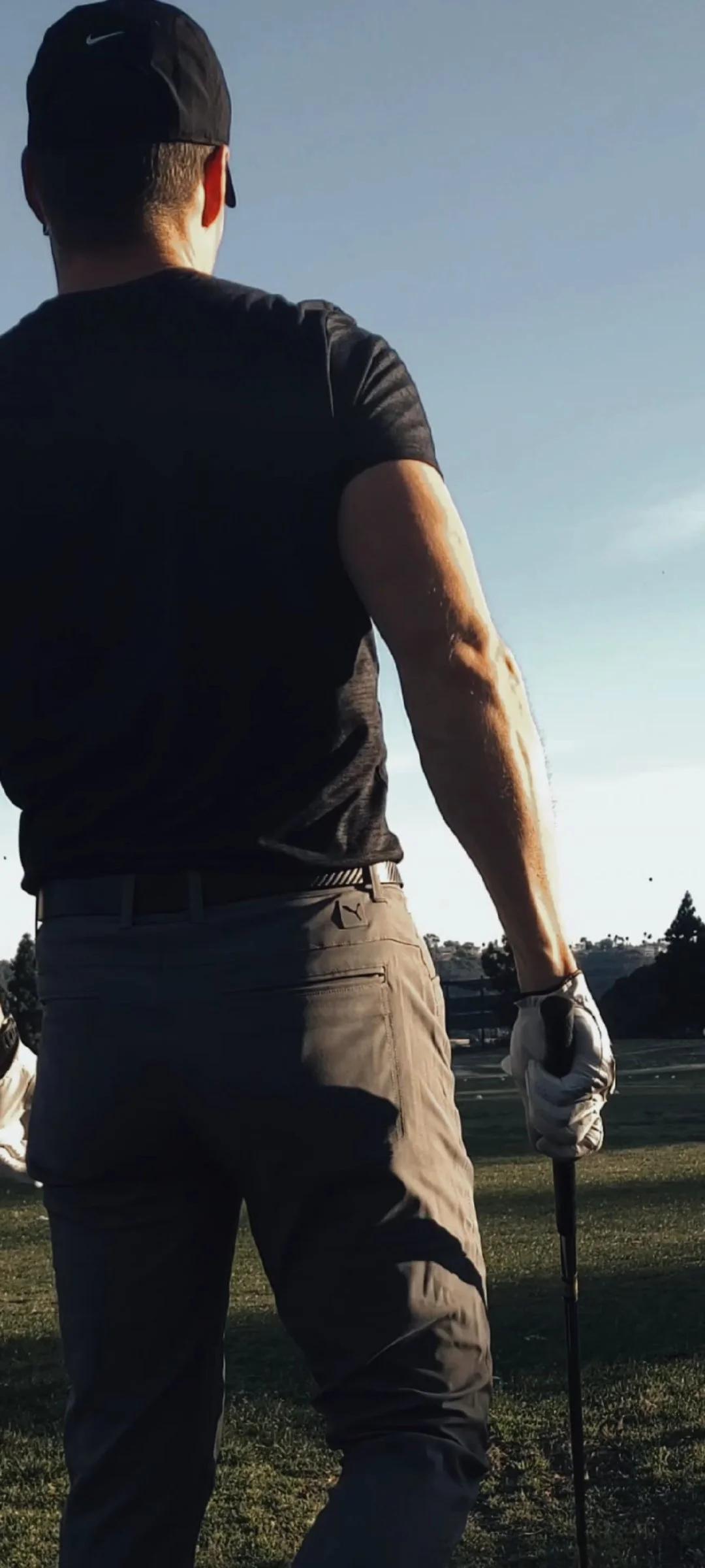 golfer on driving range