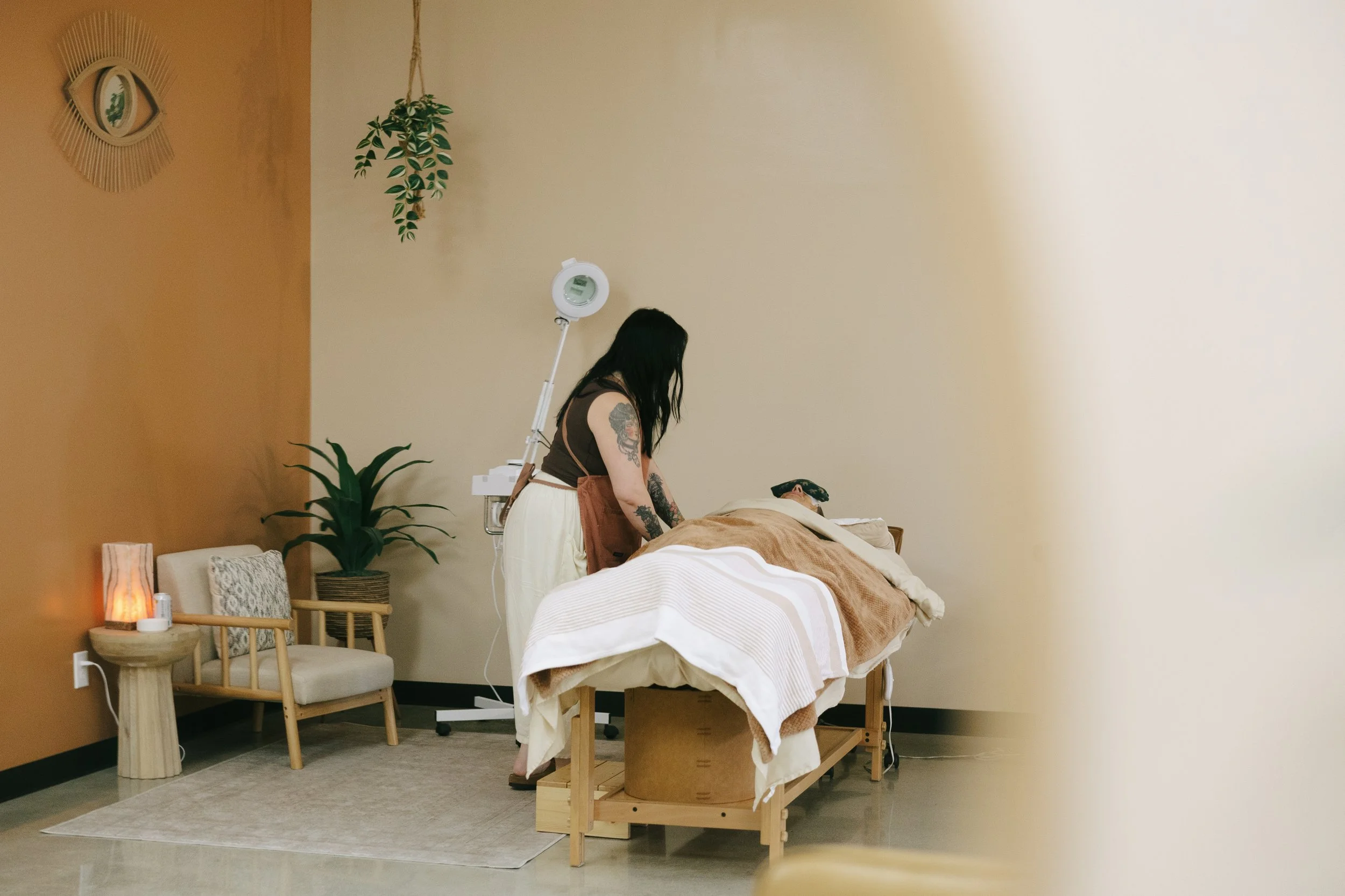 Client receiving a facial with Sam at Dahlia Beauty Bar (servicing Whitehouse, Waterville, Moncolva, Maumee, Perrysburg, Toledo)