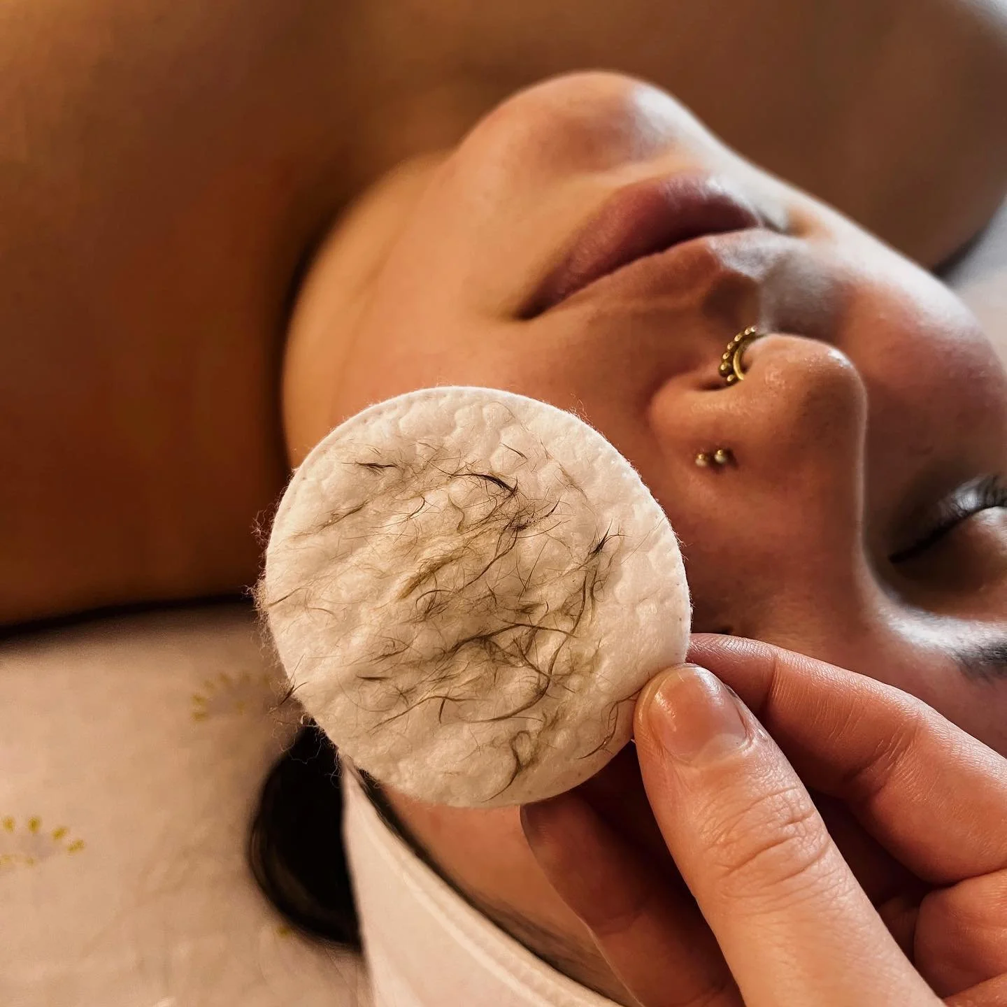 Dermaplane Facial Treatment at Dahlia Beauty Bar, best estheticians in the Toledo-area. Gentle exfoliation.