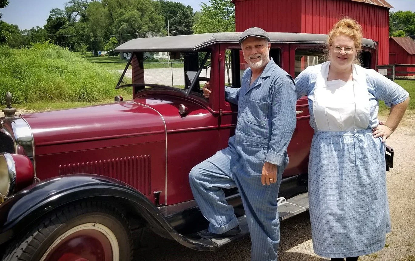 Shawnee Town volunteers by 1920s car