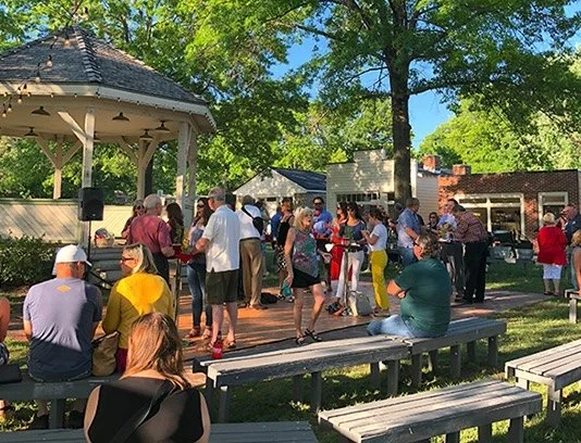 Friends gather around the gazebo in Shawnee Town