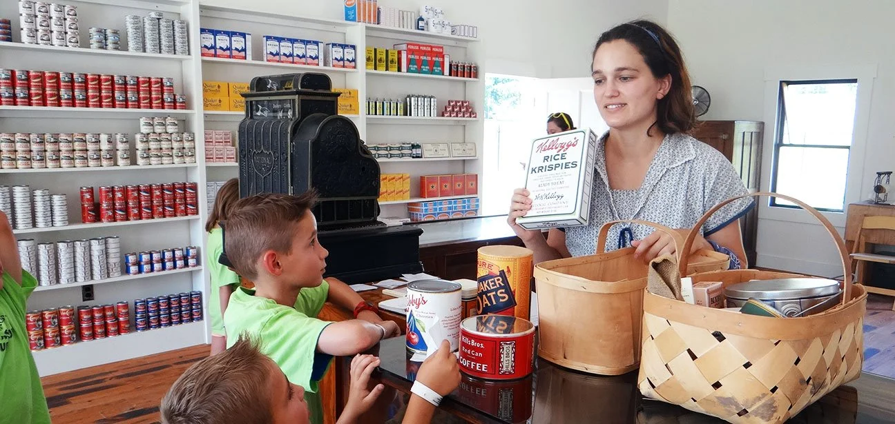 Students learning in our general store