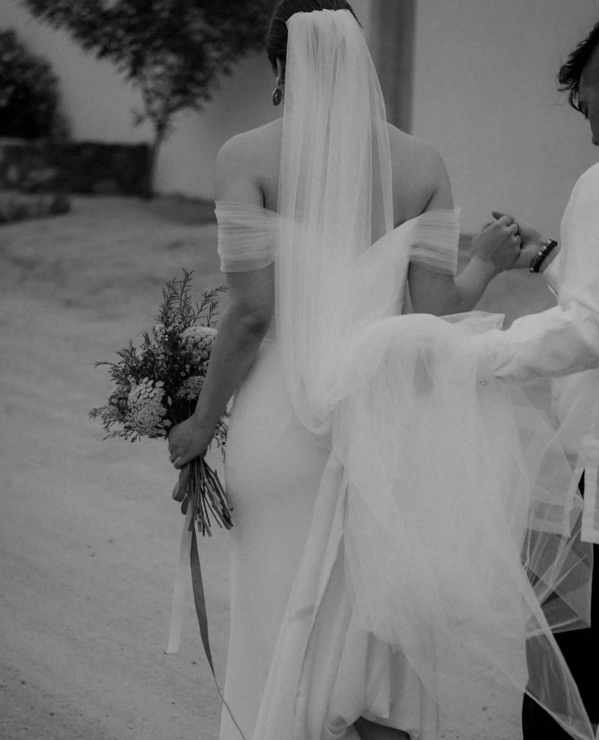 Bride with natural glam makeup and soft bridal hairstyle during an intimate wedding ceremony moment