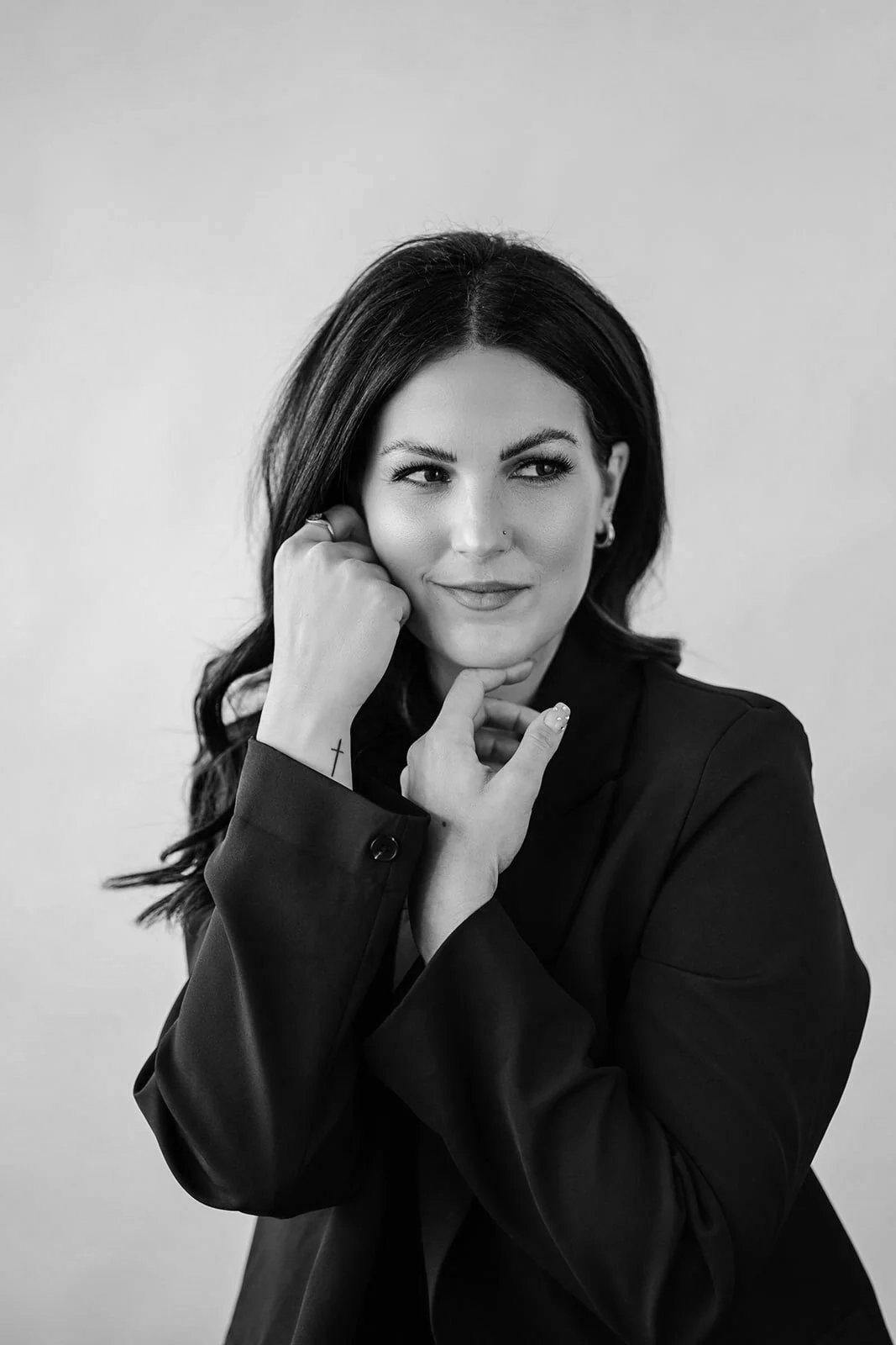 Bridal hair and makeup artist portrait showcasing a modern, elevated beauty aesthetic