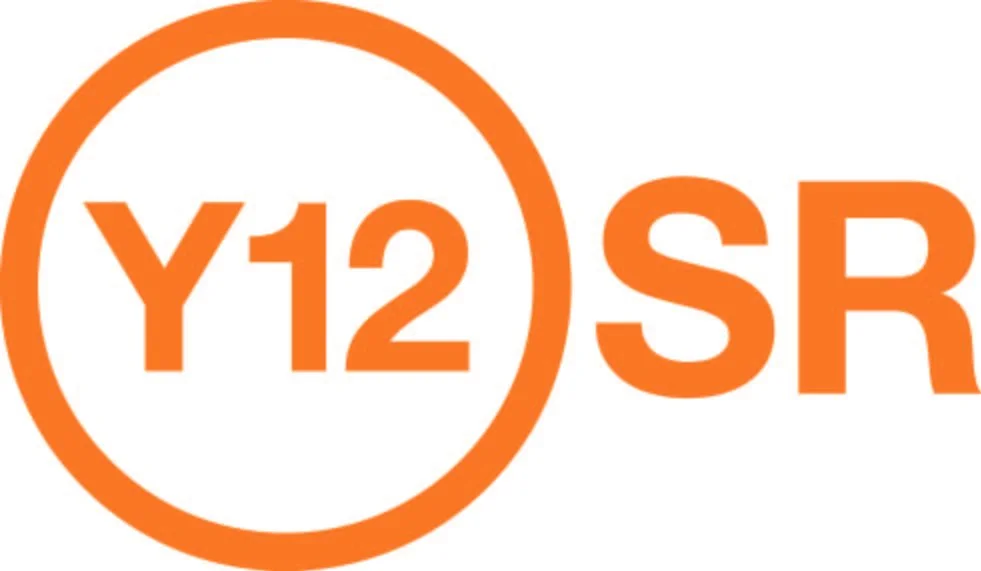 Orange logo with a circular outline and the text Y12SR inside the circle, followed by letters SR.