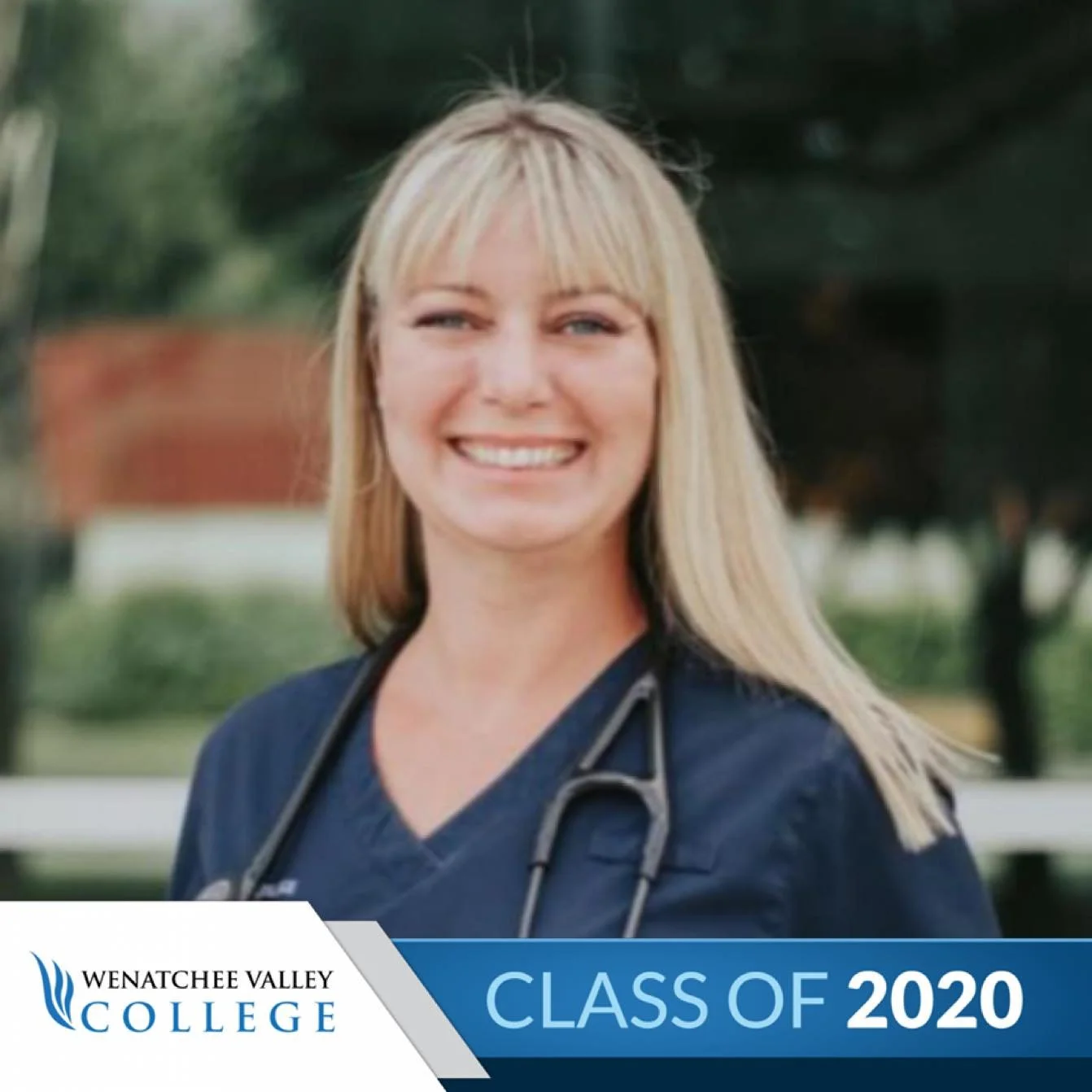 A smiling blonde woman wearing navy scrubs with a stethoscope around her neck, outdoors in a park-like setting with trees in the background, celebrating the class of 2020 from Wenatchee Valley College.