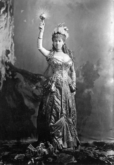 Alice Vanderbilt in her electric gown designed by Worth, 1883