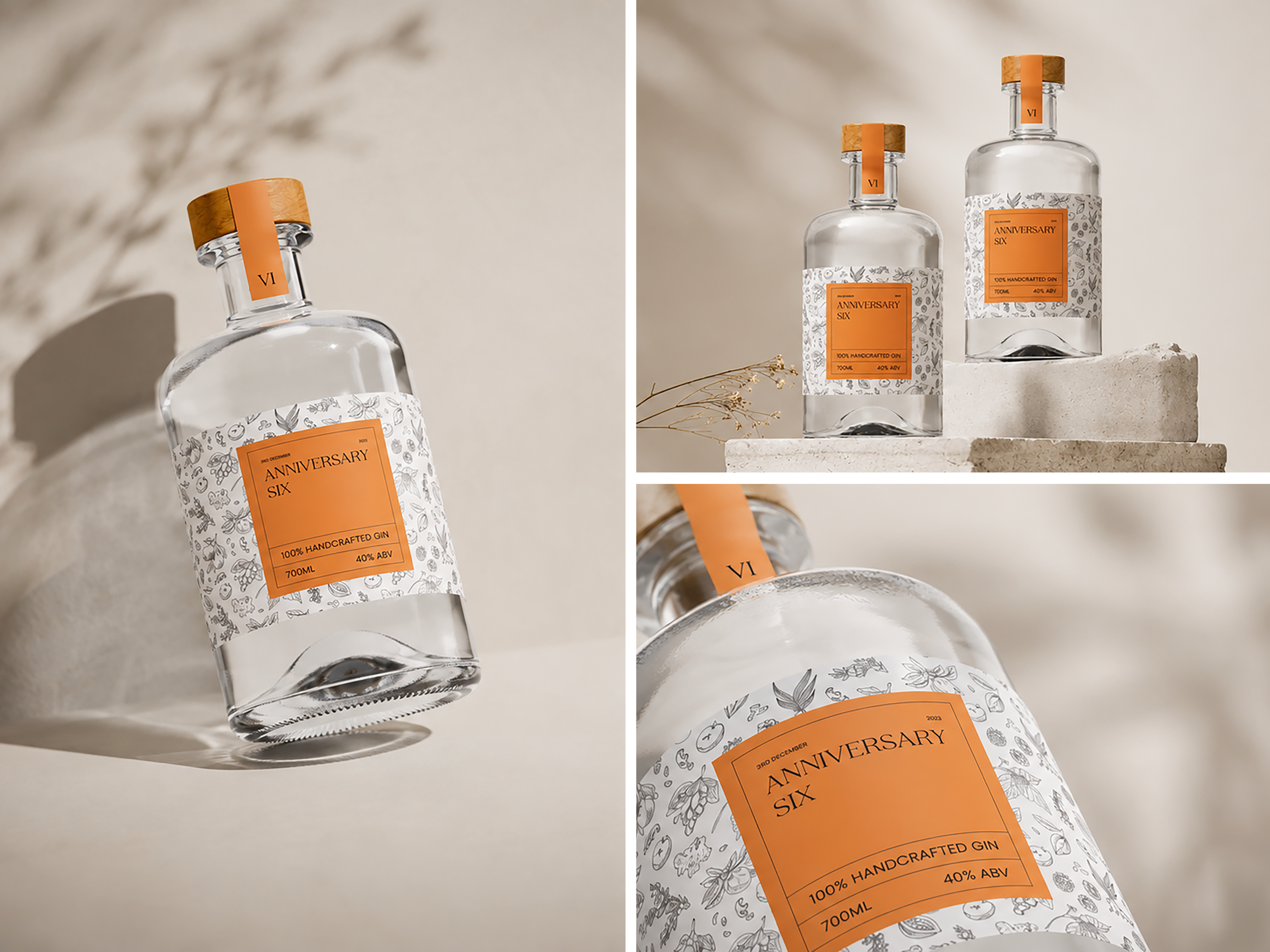 Two bottles of gin with orange labels that read "Anniversary Six", placed on a light-colored surface. The bottles have decorative labels with black illustrations and are sealed with orange caps.