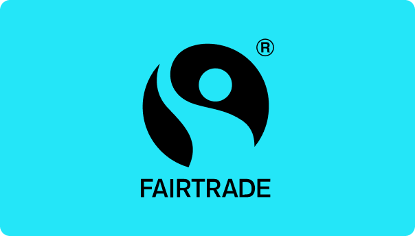 Fairtrade logo with black symbol and text on a blue background