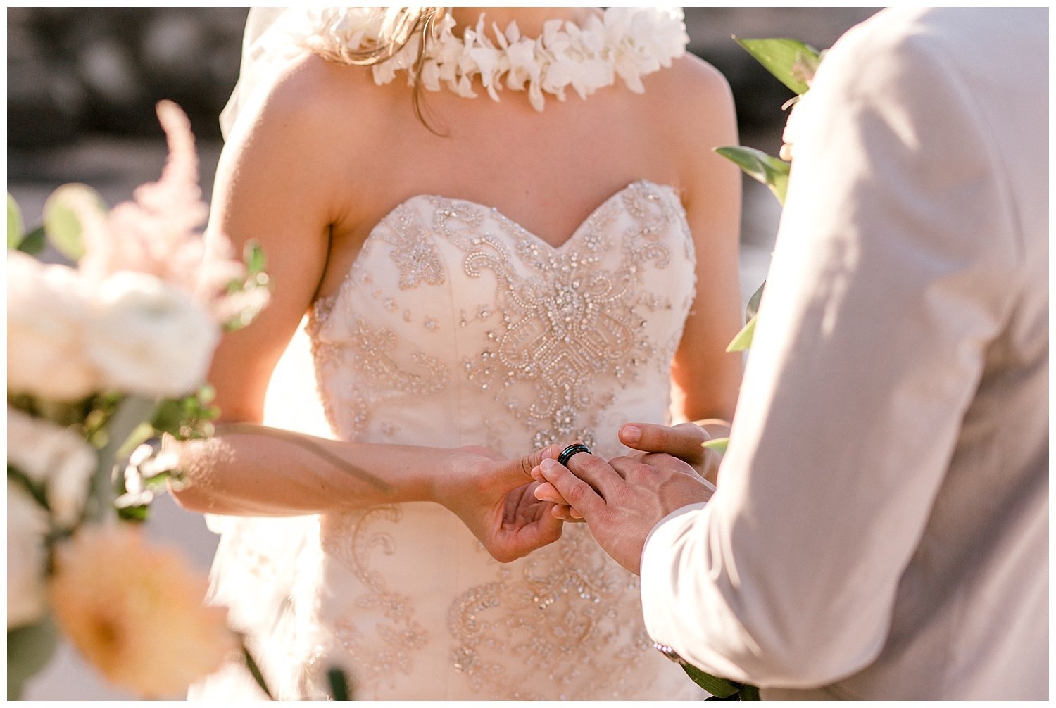 Bride and Groom Exchanging Rings during Maui Elopement