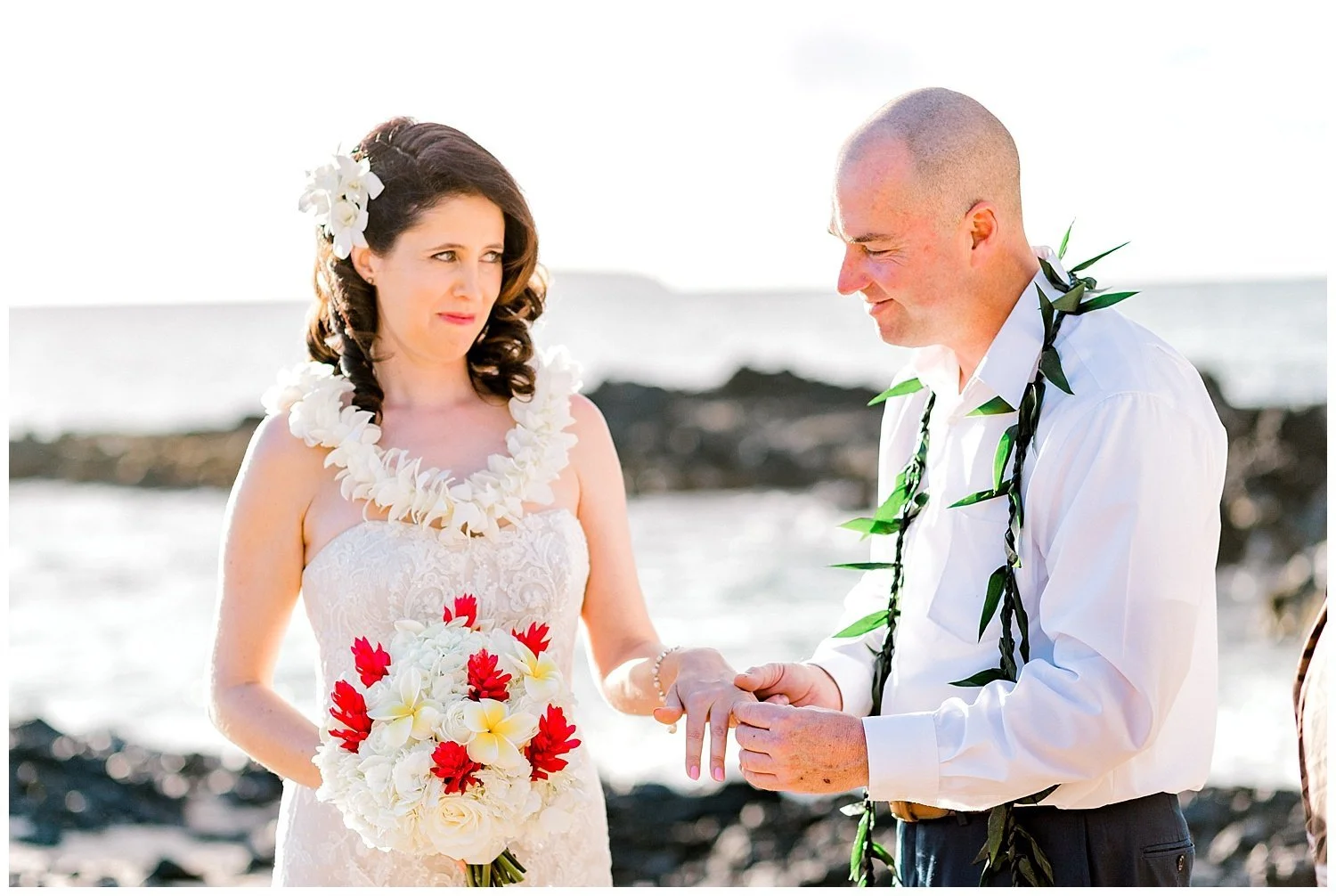 Couple-Exchanging-Rings-During-Maui-Beach-Elopement.jpg