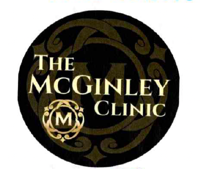 The logo for The McGinley Clinic featuring black background with gold text and design elements.